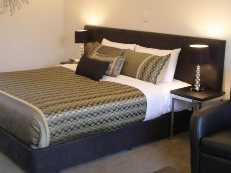 Bellano Motel Suites ไครสต์เชิร์ช ภายนอก รูปภาพ A bed